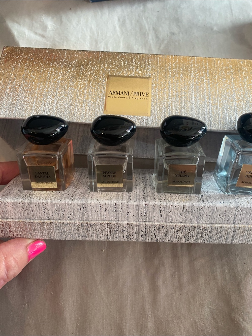 Armani Exchange Mini Fragrance Set with Black Caps and Gold Accents